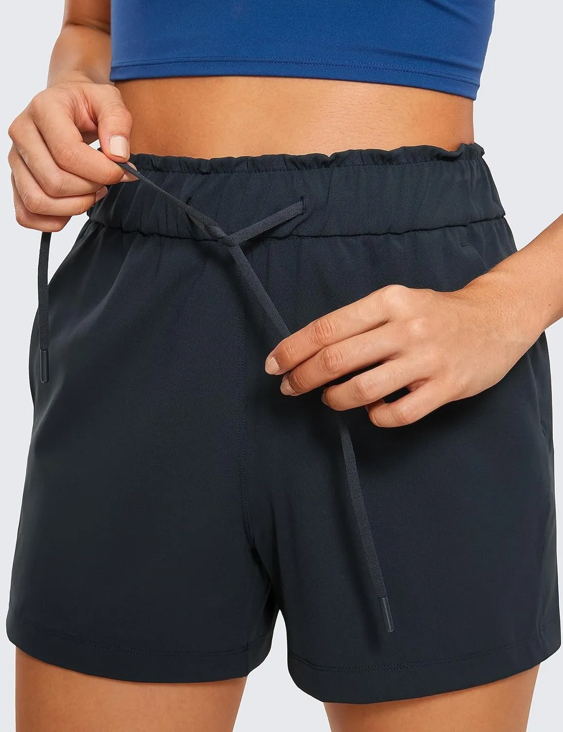 CRZ YOGA Womens 4-Way Stretch Athletic Shorts High Waisted Comfy for Work Casual Workout Golf Hiking with Pockets